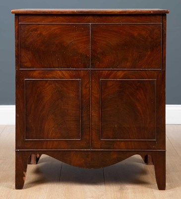 Lot 27 - A George III mahogany commode cabinet or chest...