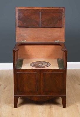 Lot 27 - A George III mahogany commode cabinet or chest...