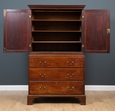 Lot 3 - A George III mahogany press cupboard with...