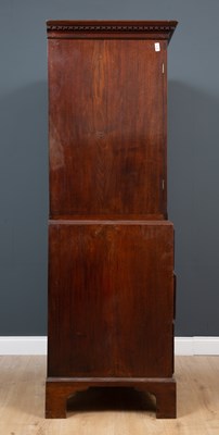 Lot 3 - A George III mahogany press cupboard with...