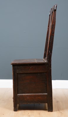 Lot 45 - A George III Irish oak country chair possibly...