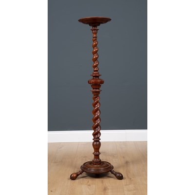 Lot 47 - An 18th century yew wood torchiere with...