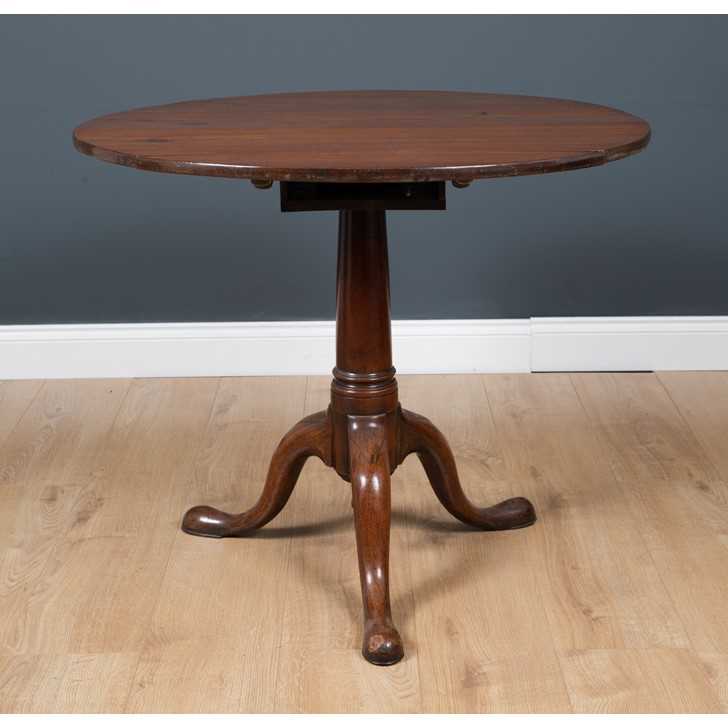 Lot 4 - A George III mahogany circular tilt top...