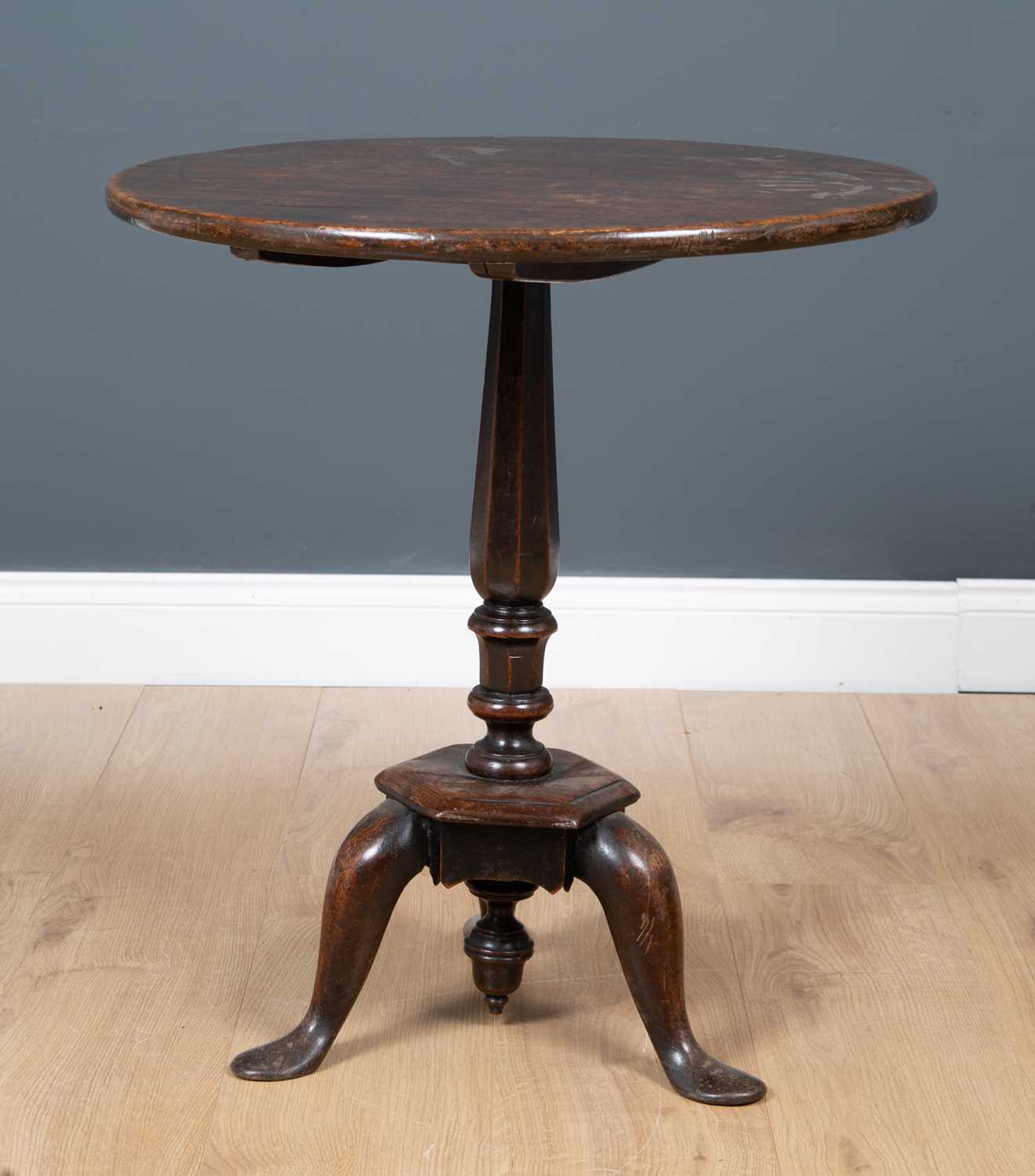 Lot 30 - A George III country made mahogany circular...