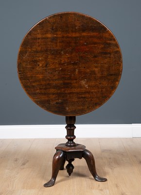 Lot 30 - A George III country made mahogany circular...