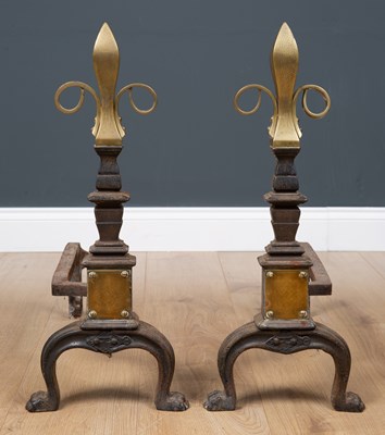 Lot 32 - A pair of Victorian brass and cast iron fire...