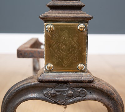 Lot 32 - A pair of Victorian brass and cast iron fire...