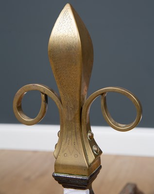 Lot 32 - A pair of Victorian brass and cast iron fire...