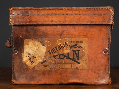 Lot 7 - A wicker fishing creel with leather strap,...