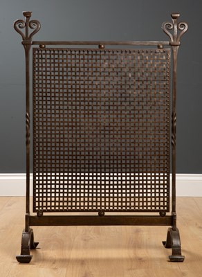 Lot 461 - A late 19th century steel arts and crafts fire...