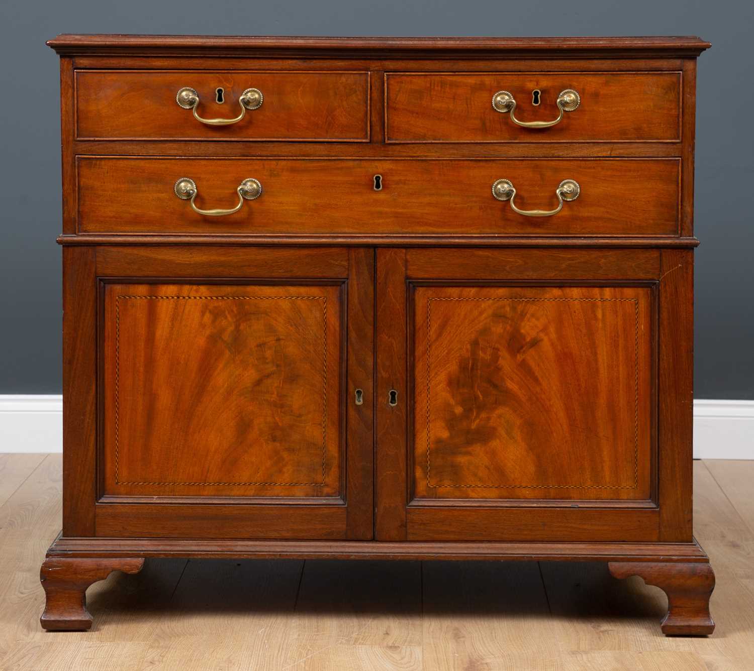 Lot 49 - A mid 19th century mahogany cabinet with two...