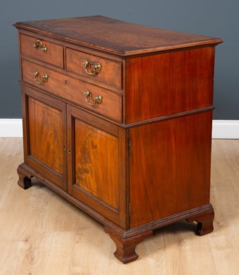 Lot 49 - A mid 19th century mahogany cabinet with two...