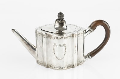 Lot 730 - A George III silver teapot, of shaped oval...