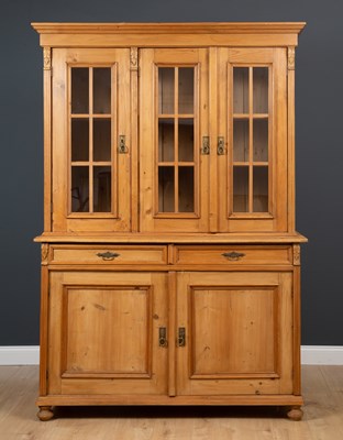 Lot 207 - A modern pine dresser with glazed doors above...