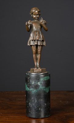 Lot 310 - An Art Deco style bronze statuette of a girl...