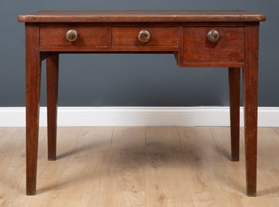 Lot 263 - An antique pitch pine desk the three drawers...