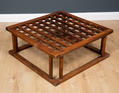 Lot 554 - An old Japanese elm kotatsu table with turned...