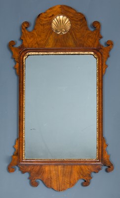 Lot 262 - A Georgian style walnut fret framed wall...