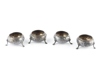 Lot 854 - A set of four Victorian silver cauldron salts,...