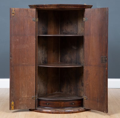 Lot 122 - An early 18th century bow fronted figured...