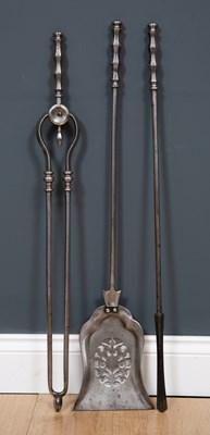 Lot 195 - A set of three steel fire irons comprising a...