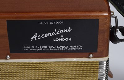 Lot 115 - A Cav. Dino Baffetti melodeon with fretted end...