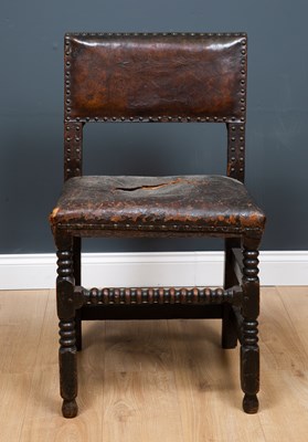 Lot 118 - A late 17th / early 18th century oak leather...