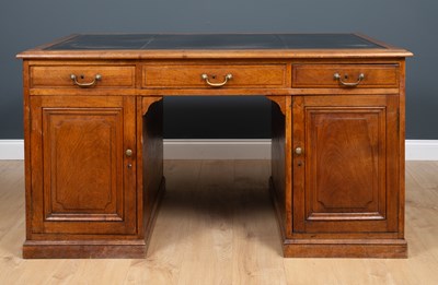 Lot 418 - An early 20th century walnut partners desk...