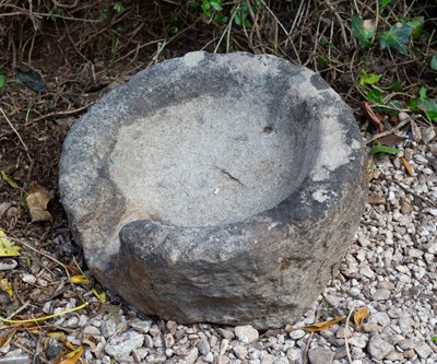 Lot 661 - An ancient Mortar Stone with shallow interior,...