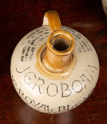 Lot 12 - A Victorian stoneware whiskey jar by H Kennedy...