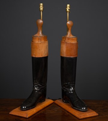 Lot 21 - A pair of table lamps constructed from brown...