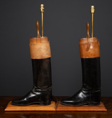 Lot 21 - A pair of table lamps constructed from brown...