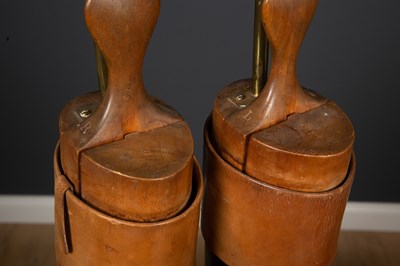Lot 21 - A pair of table lamps constructed from brown...