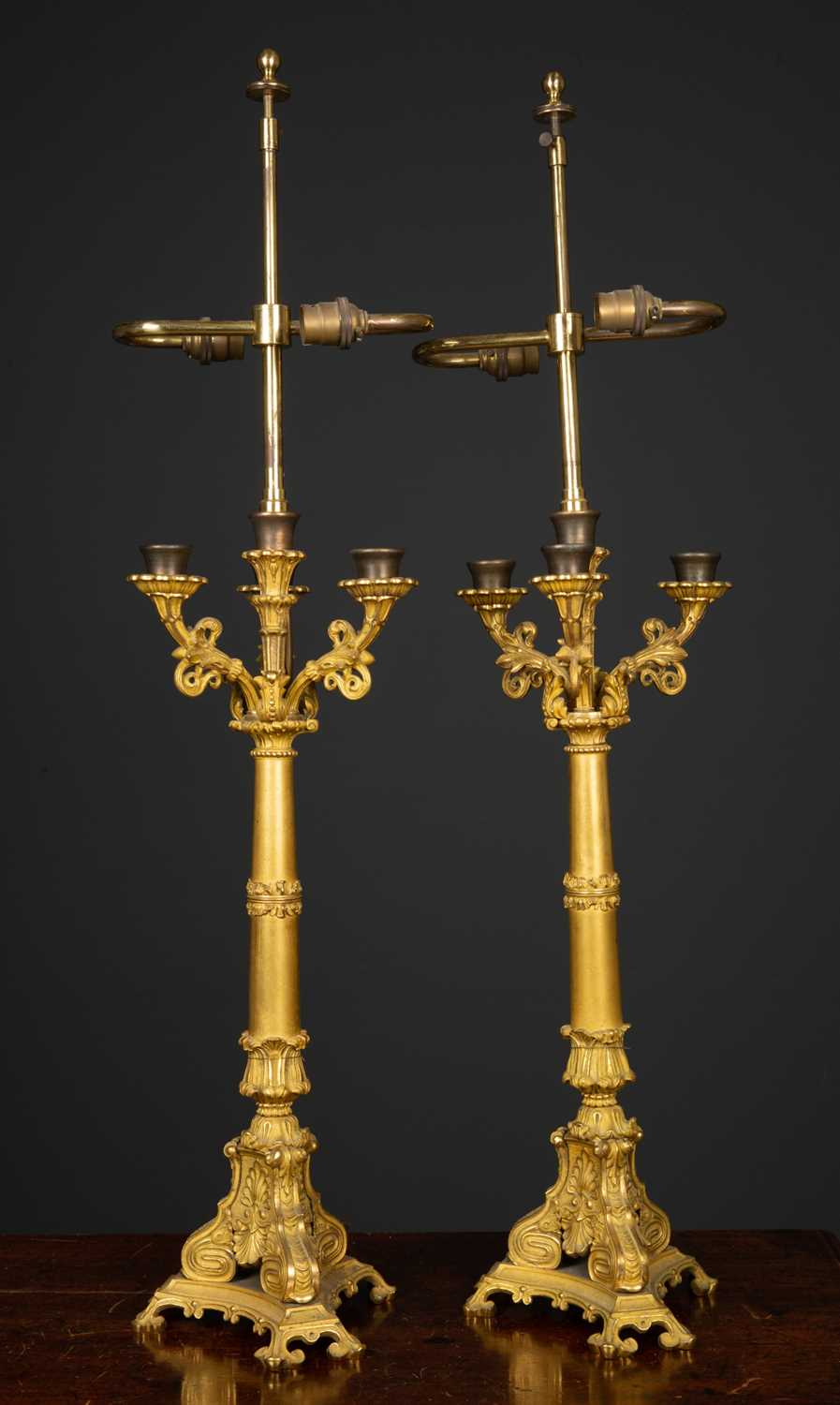 Lot 34 - A pair of table lamps constructed from ormolu...