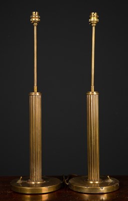 Lot 13 - A pair of circular brass table lamps with...