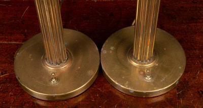 Lot 13 - A pair of circular brass table lamps with...