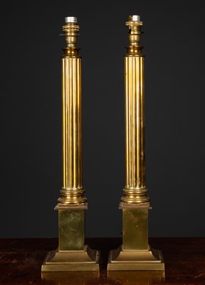 Lot 15 - A pair of brass table lamps of classical...