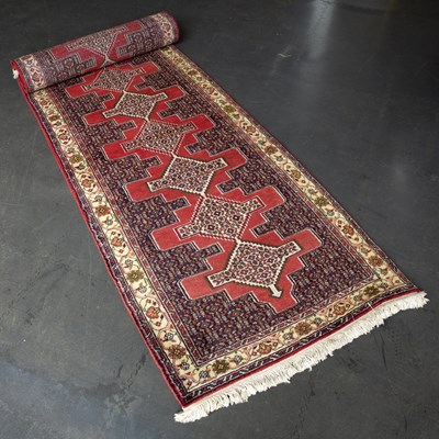 Lot 610 - A late 20th century Middle Eastern style red...