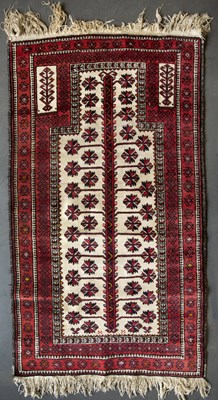 Lot 614 - An antique blue and red ground Middle Eastern...