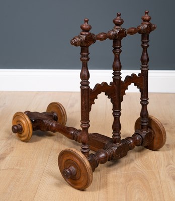 Lot 121 - An Indian rosewood Rajastani baby walker with...