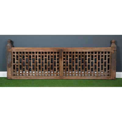 Lot 550 - An antique Indian hardwood balustrade section...