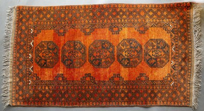 Lot 619 - A late 20th century Eastern red, yellow and...