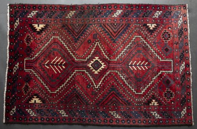 Lot 622 - A Middle Eastern red ground rug 248cm x 171cm