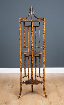 Lot 320 - A Victorian bamboo three tier corner whatnot...