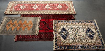 Lot 623 - Four Eastern rugs: 150cm x 104cm; 200cm x...