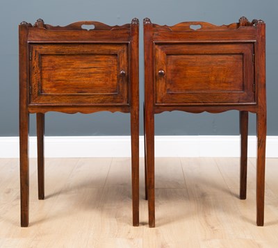 Lot 329 - A pair of George III mahogany pot cupboards,...