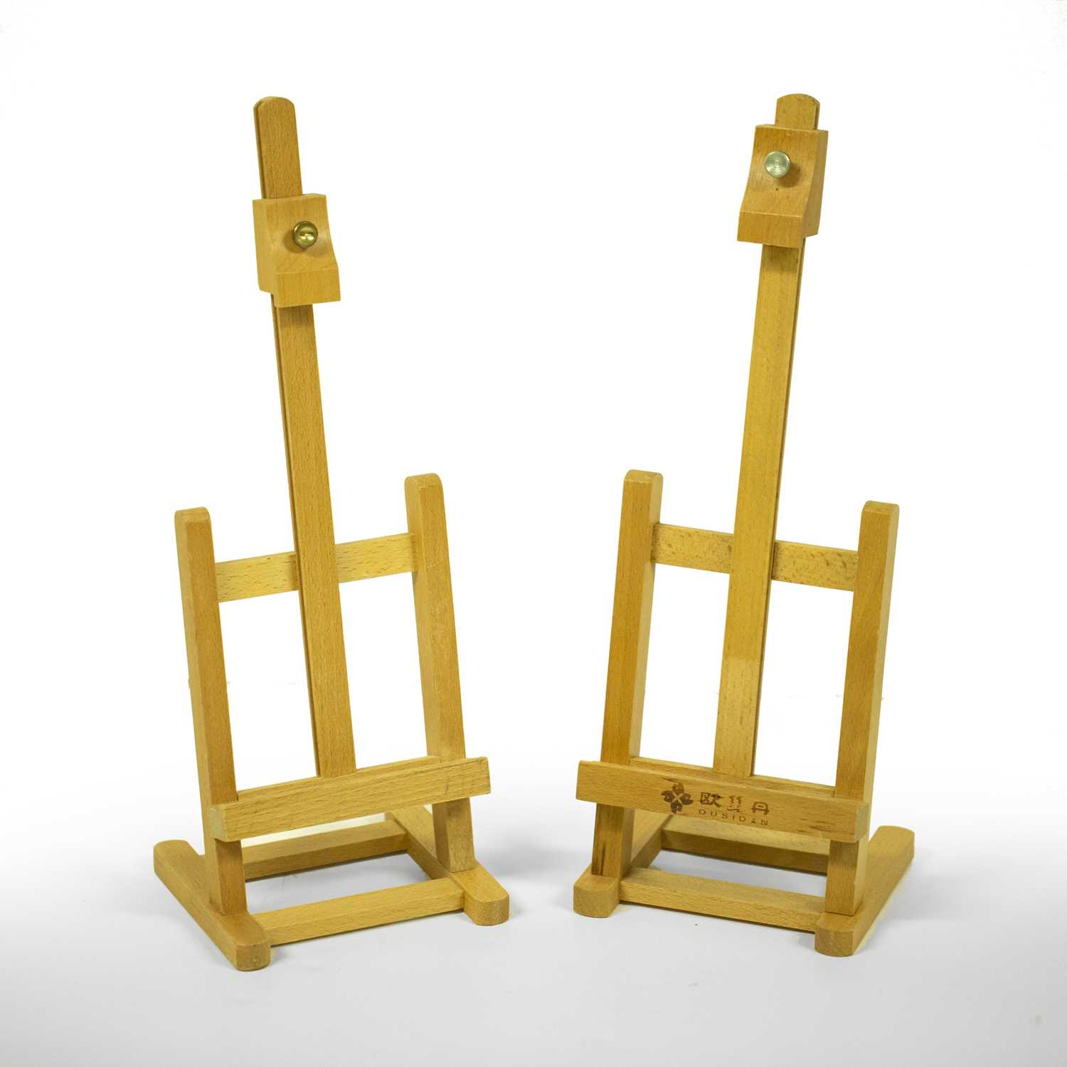 Lot 508 - An Ousiden table top beechwood picture easel,...
