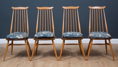 Lot 406 - A set of four 1970's Ercol light elm and beech...