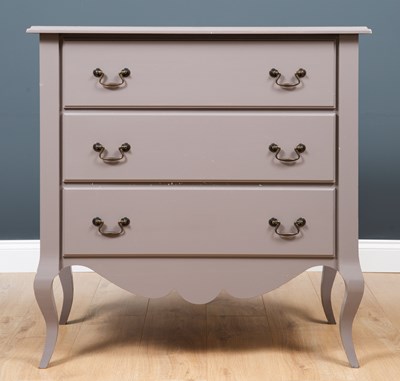 Lot 334 - A grey painted chest of three drawers with...