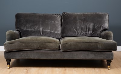 Lot 213 - A contemporary grey upholstered sofa with...